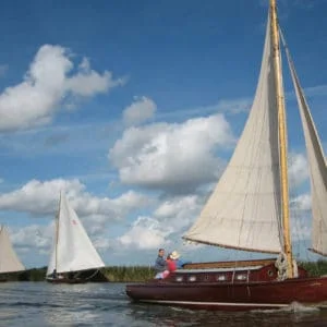 The Lullaby class Lucent a traditional wooden sailing cabin yacht on the Norfolk Broads.