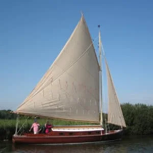 Lucent, the traditional Norfolk Broads Lullaby class cabin yacht sailing on the Norfolk Broads.