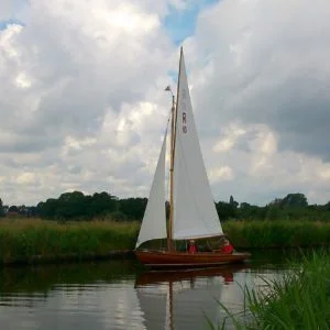 A Rebel class wooden half decker used for skippered sails on the Norfolk Broads